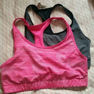 Two reversible Champion sports bras